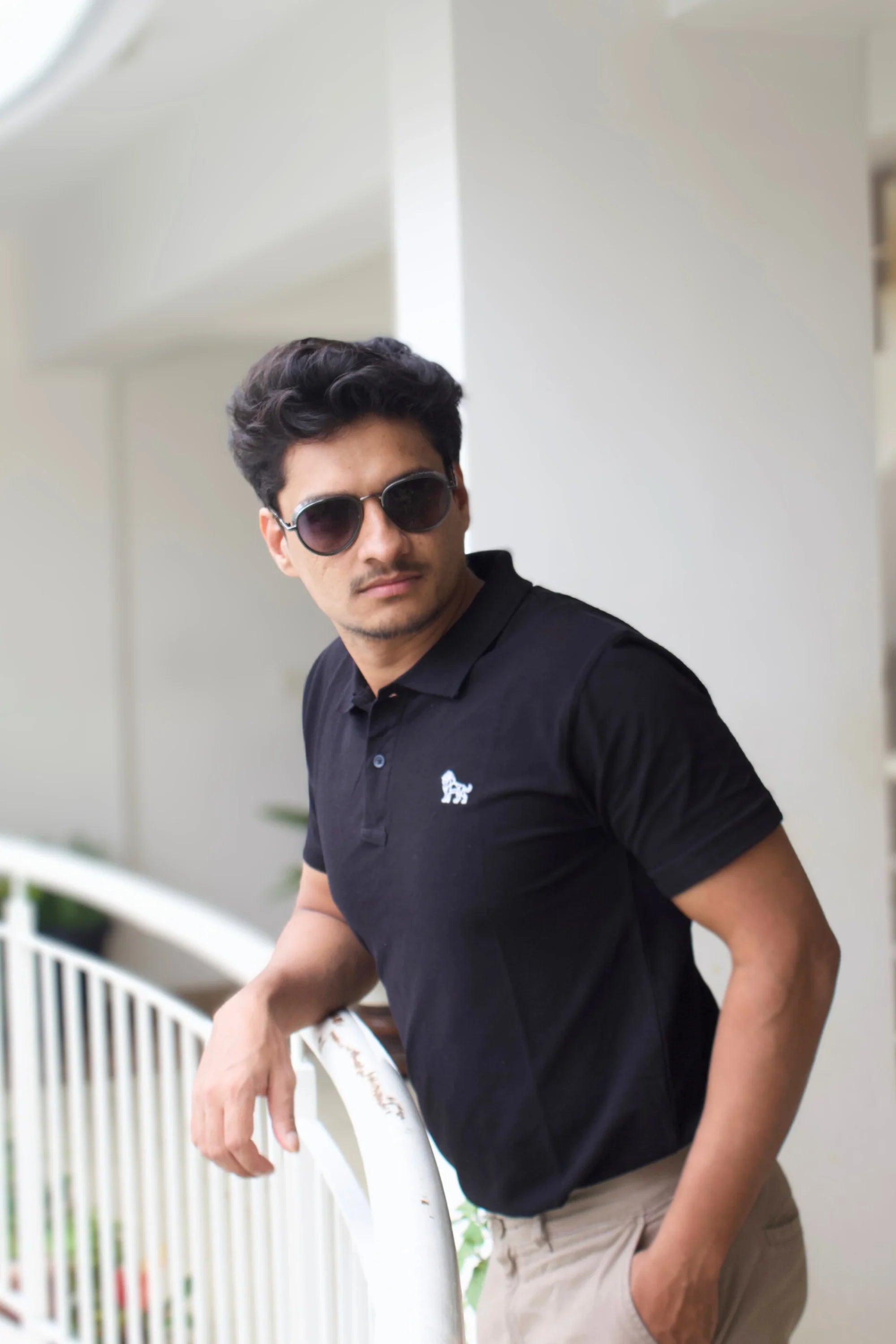 Model wearing Ebon Luxe black oversized polo t-shirt – Cooleo India
