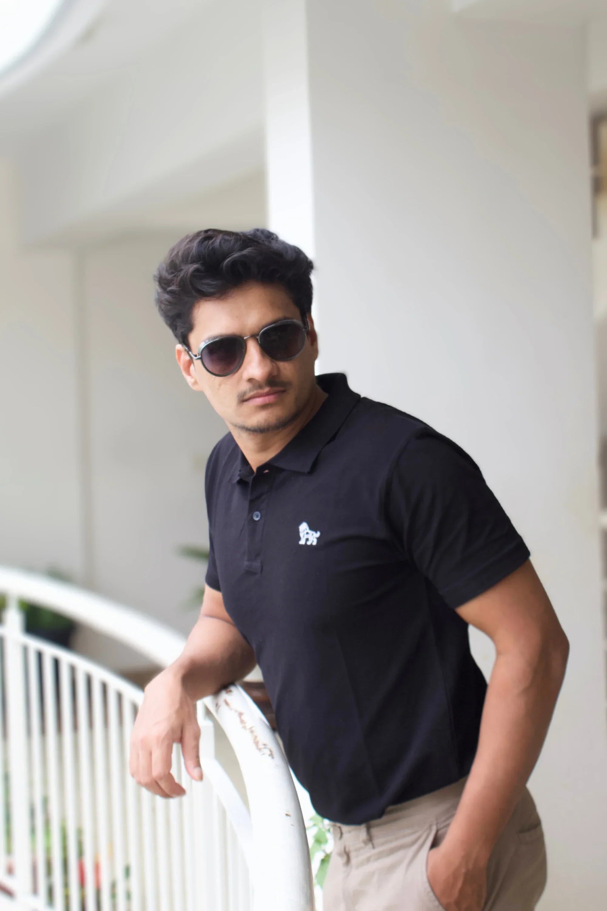Model wearing Ebon Luxe black oversized polo t-shirt – Cooleo India