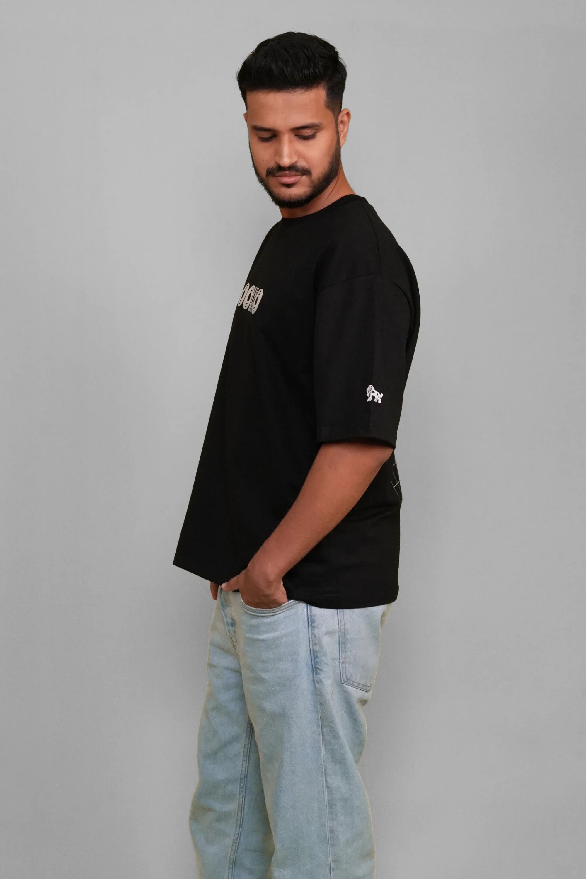 Side view of Midnight Rise Luxe black streetwear tee – Cooleo