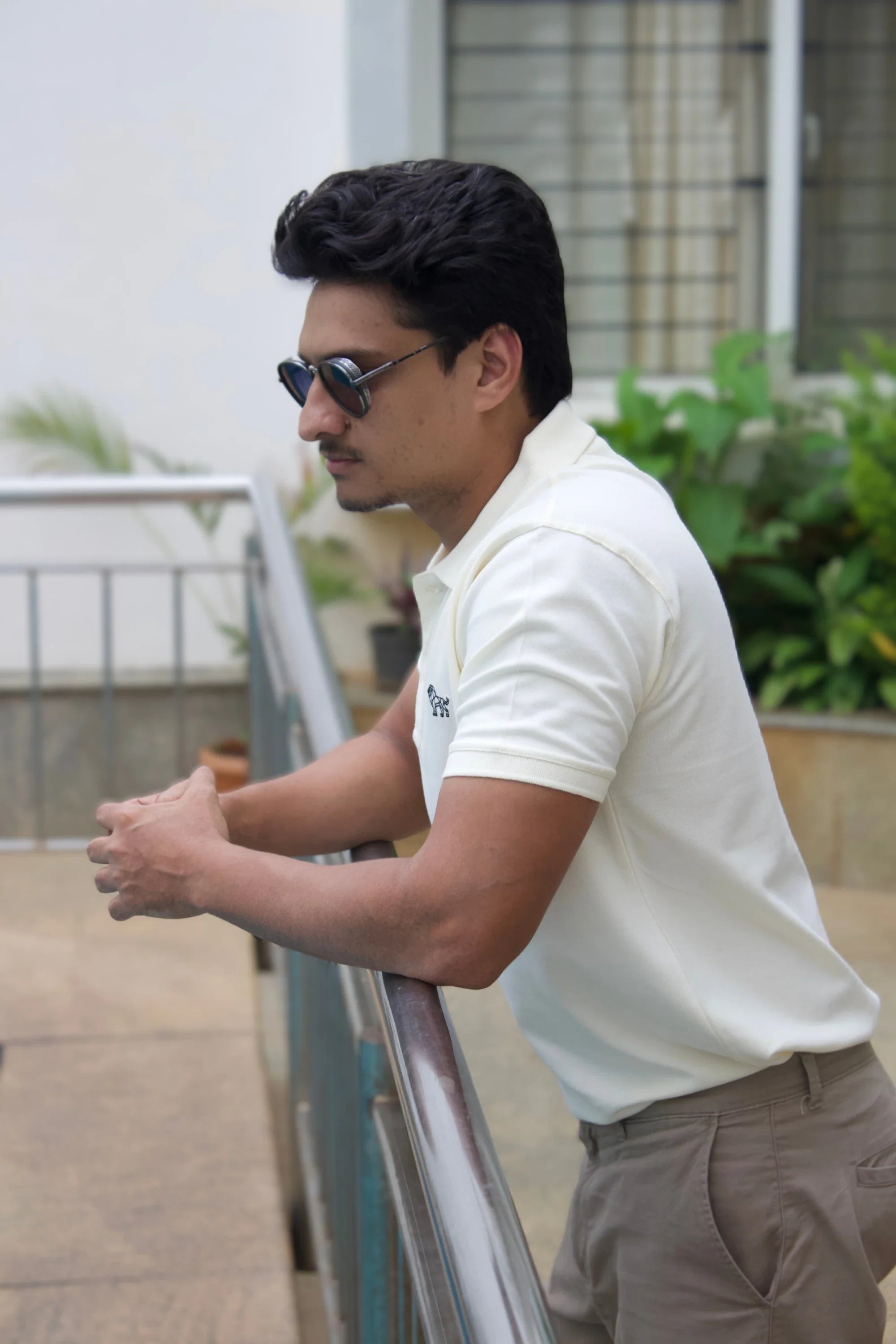 Side view of Ivory Horizon white oversized polo tee – Cooleo