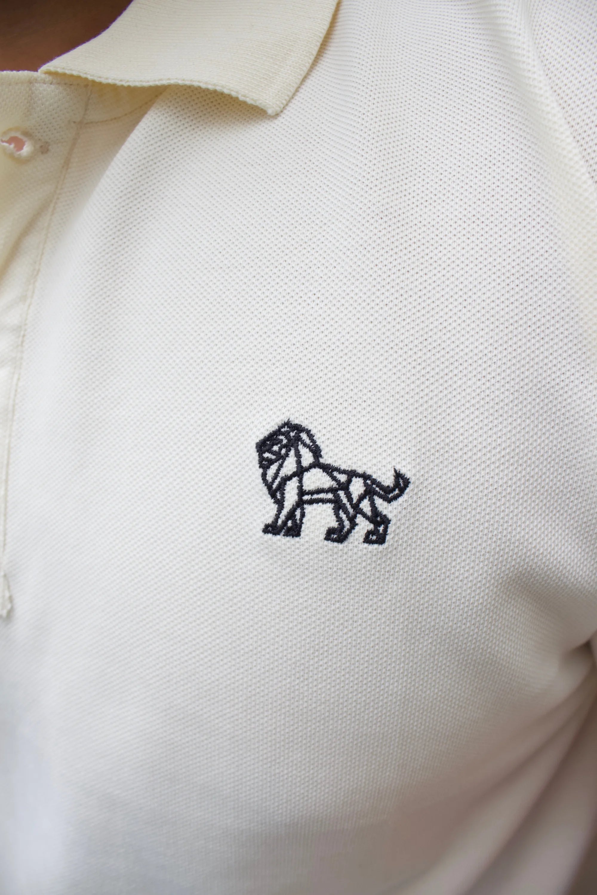Close-up of soft cotton on Ivory Horizon white polo – Cooleo