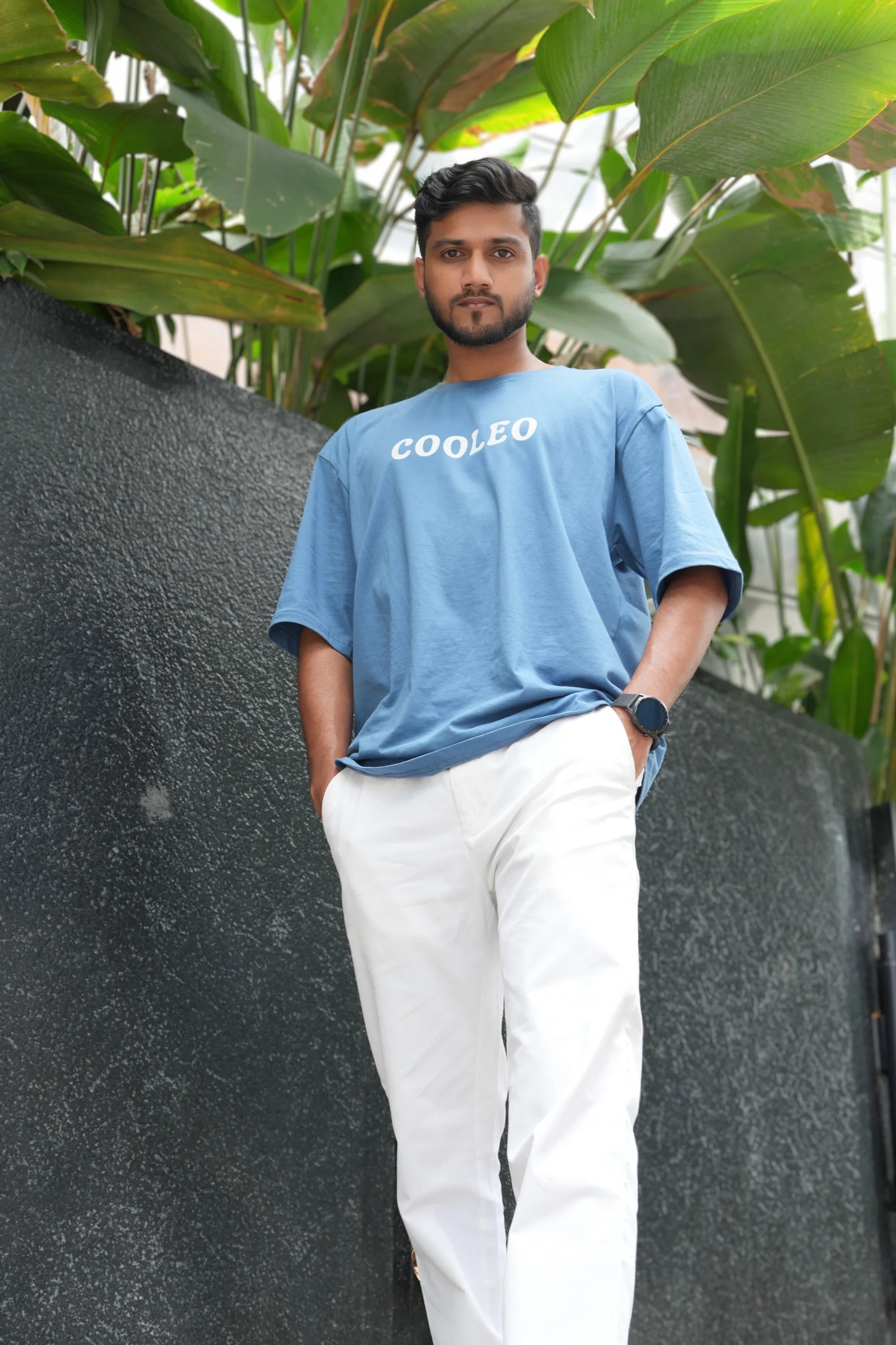 Model wearing Fearless Blue Mist oversized blue tee by Cooleo