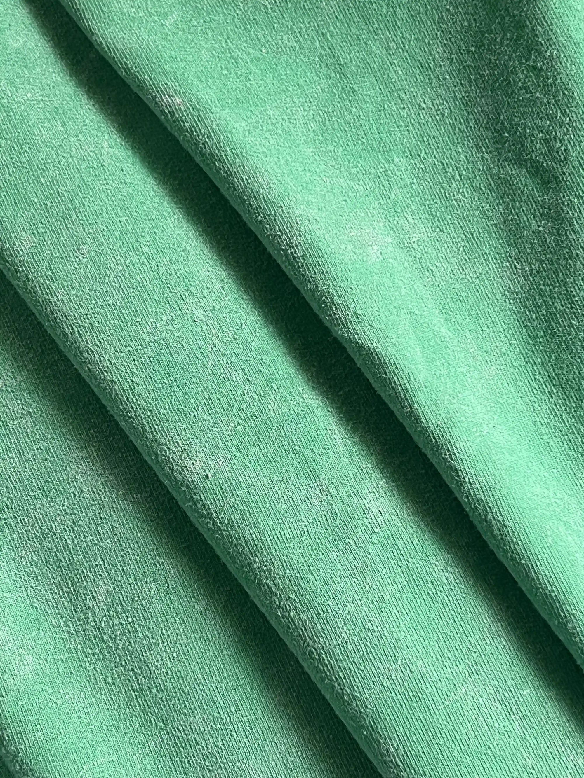 Green acid wash t-shirt close-up view – Cooleo India
