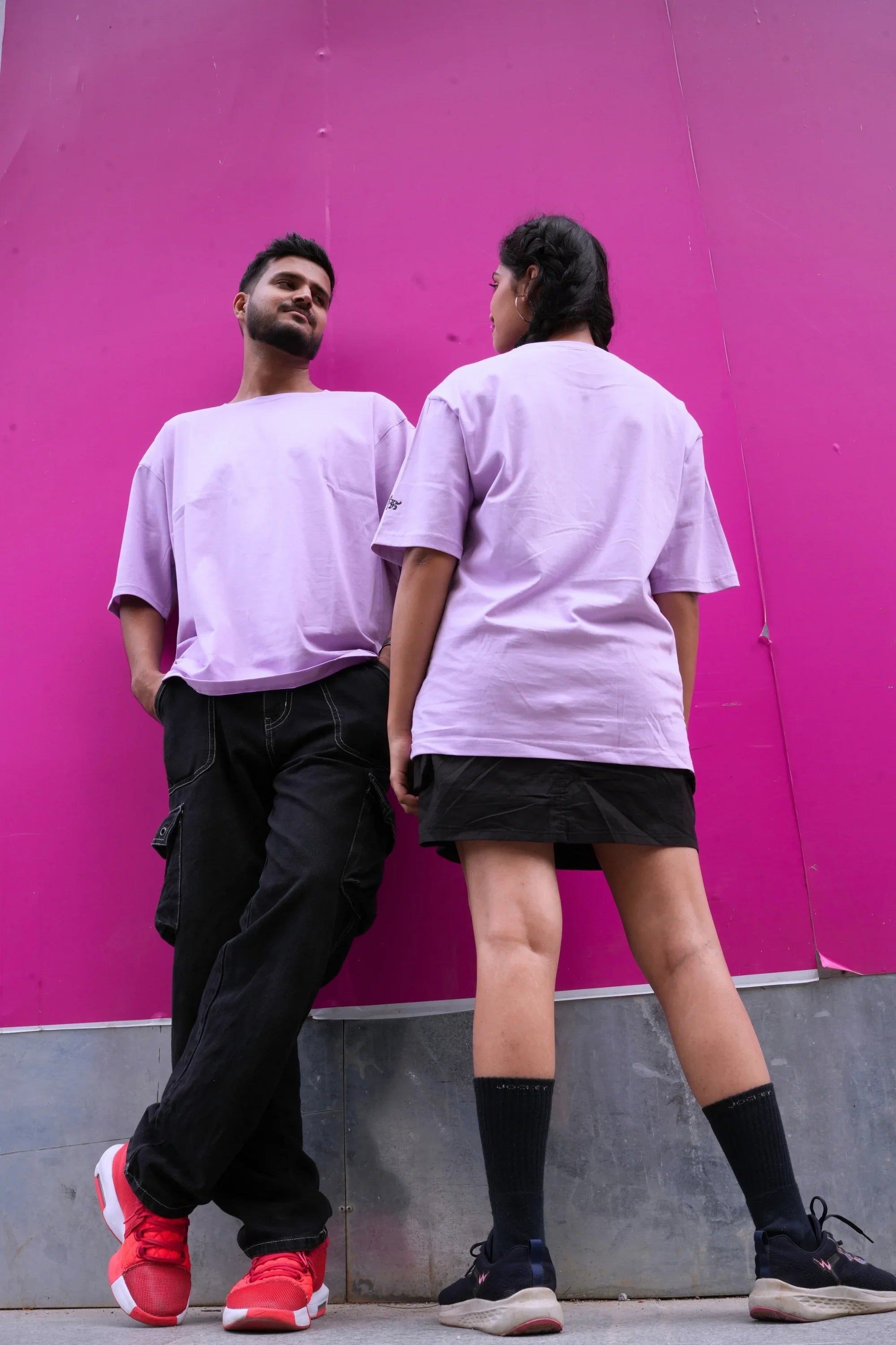 Model wearing Mauve Shadow lavender oversized tee by Cooleo India