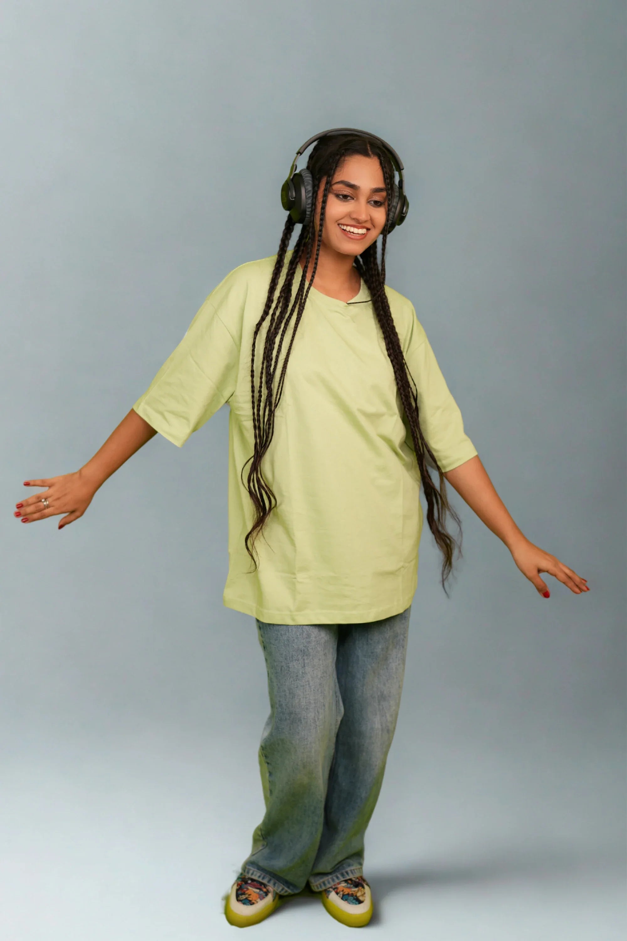 Model wearing Mint Drift mint green oversized tee by Cooleo India