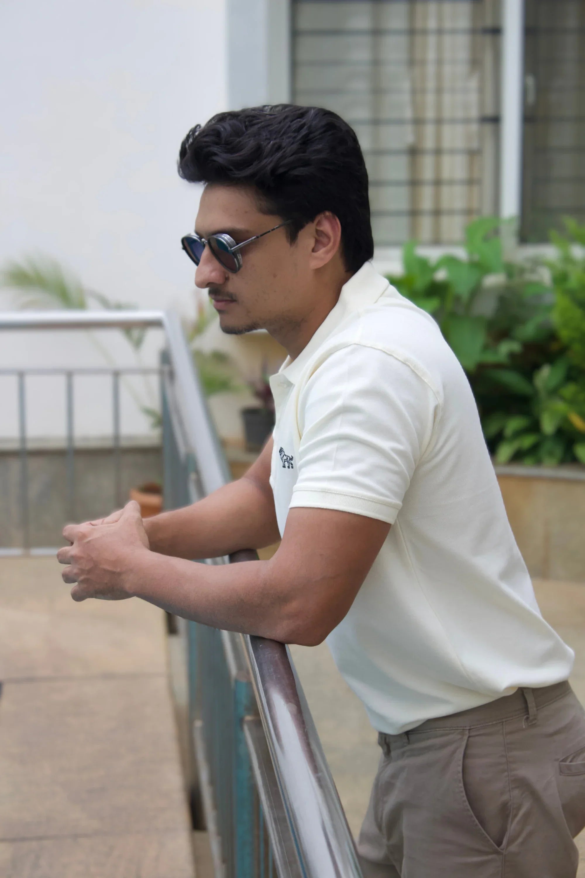 Side view of Ivory Horizon white oversized polo tee – Cooleo